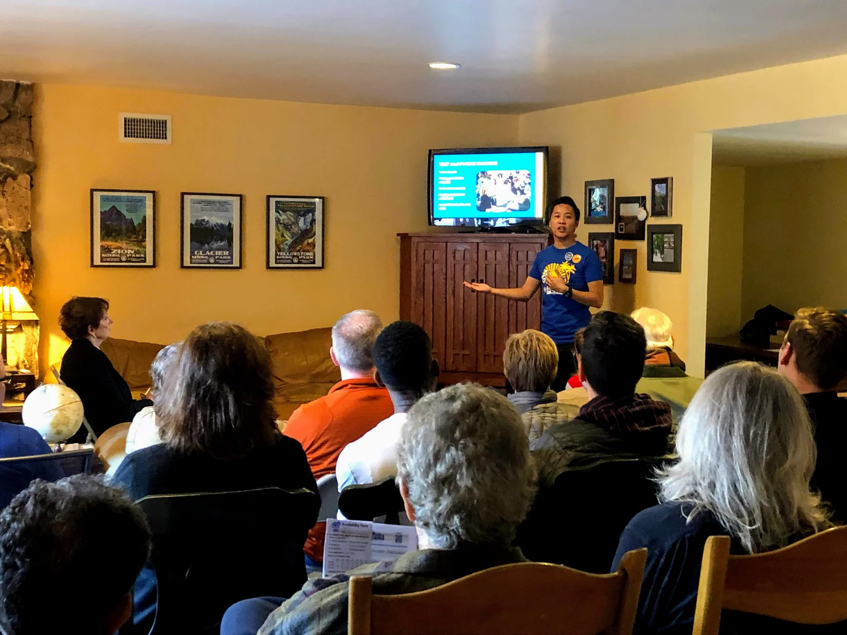 Volunteers seated at an orientation presentation in January 2020